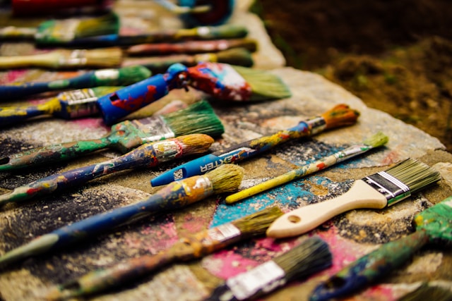 brushes and paint on the table